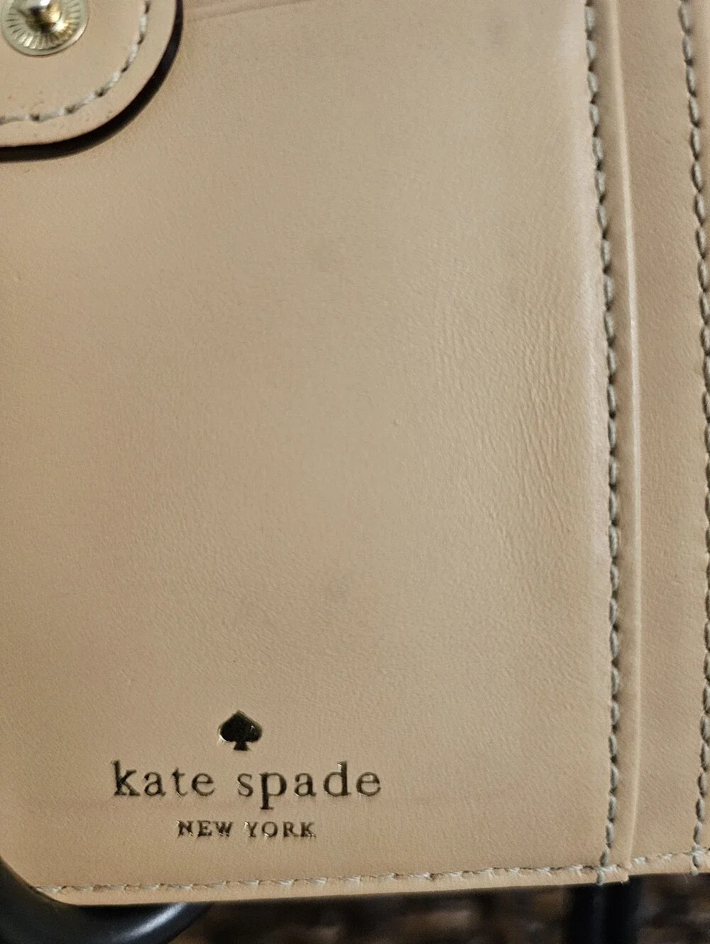 kate spade black pebbled leather continental wallet with gold logo